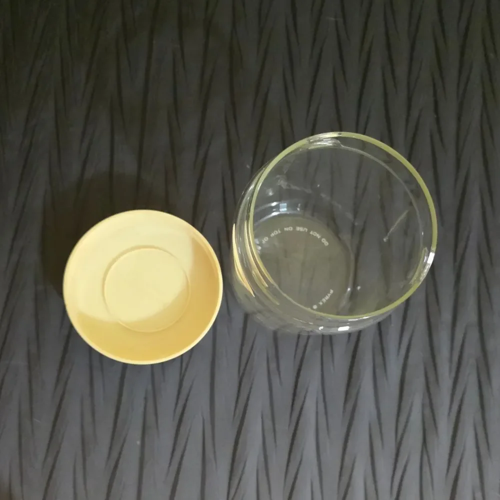 1970s Pyrex Glass Storage Jar with Beige Lid.